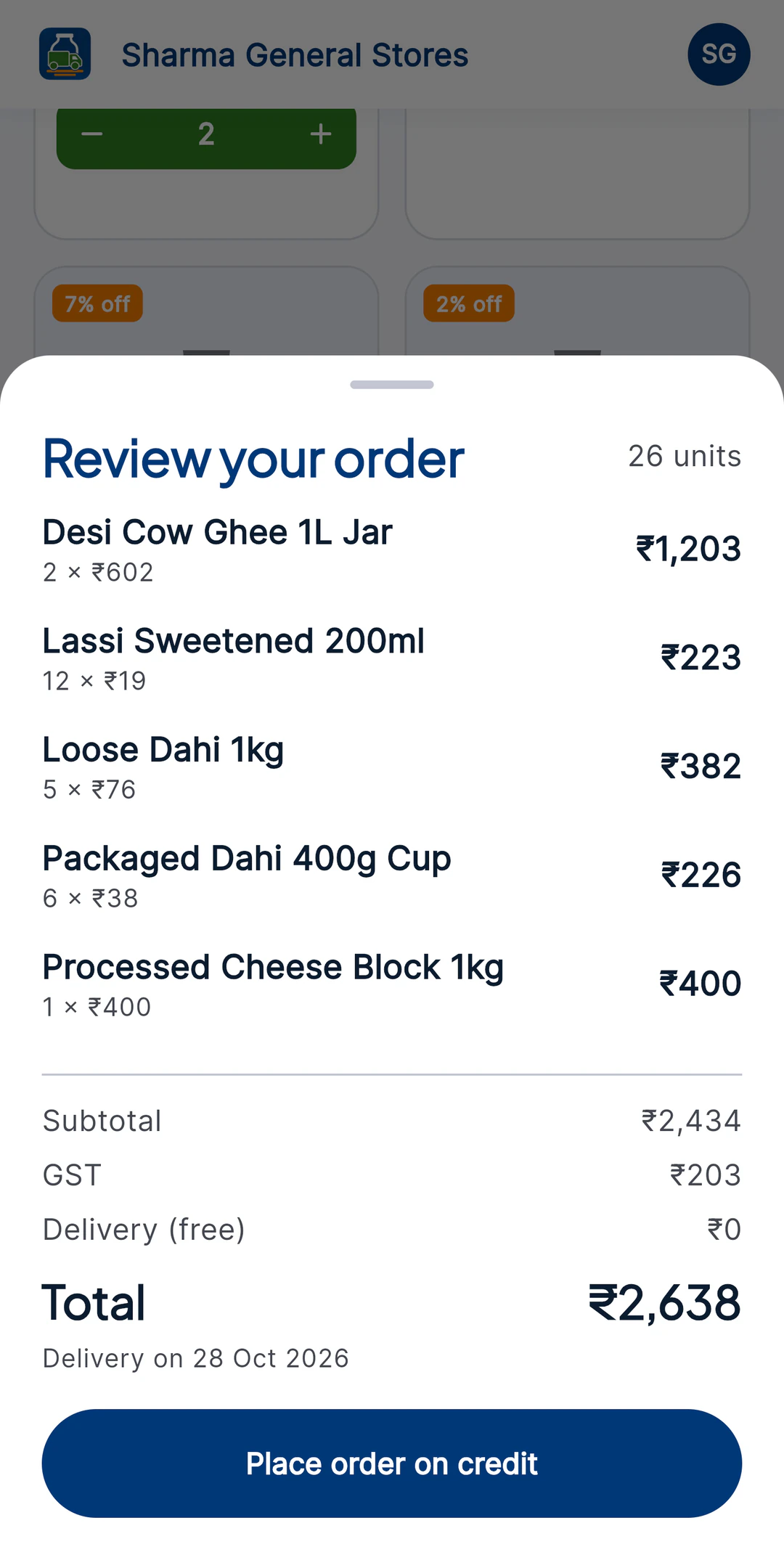 Dairy To Go app: reviewing an order with GST and the delivery date before placing it on credit